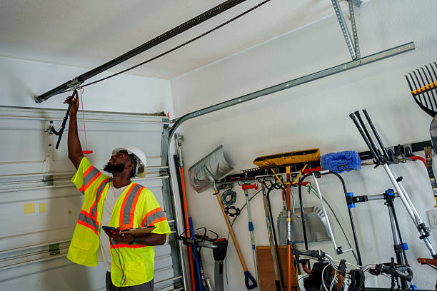 Professional Garage Door Panel Replacement technician working in Barbourmeade, KY